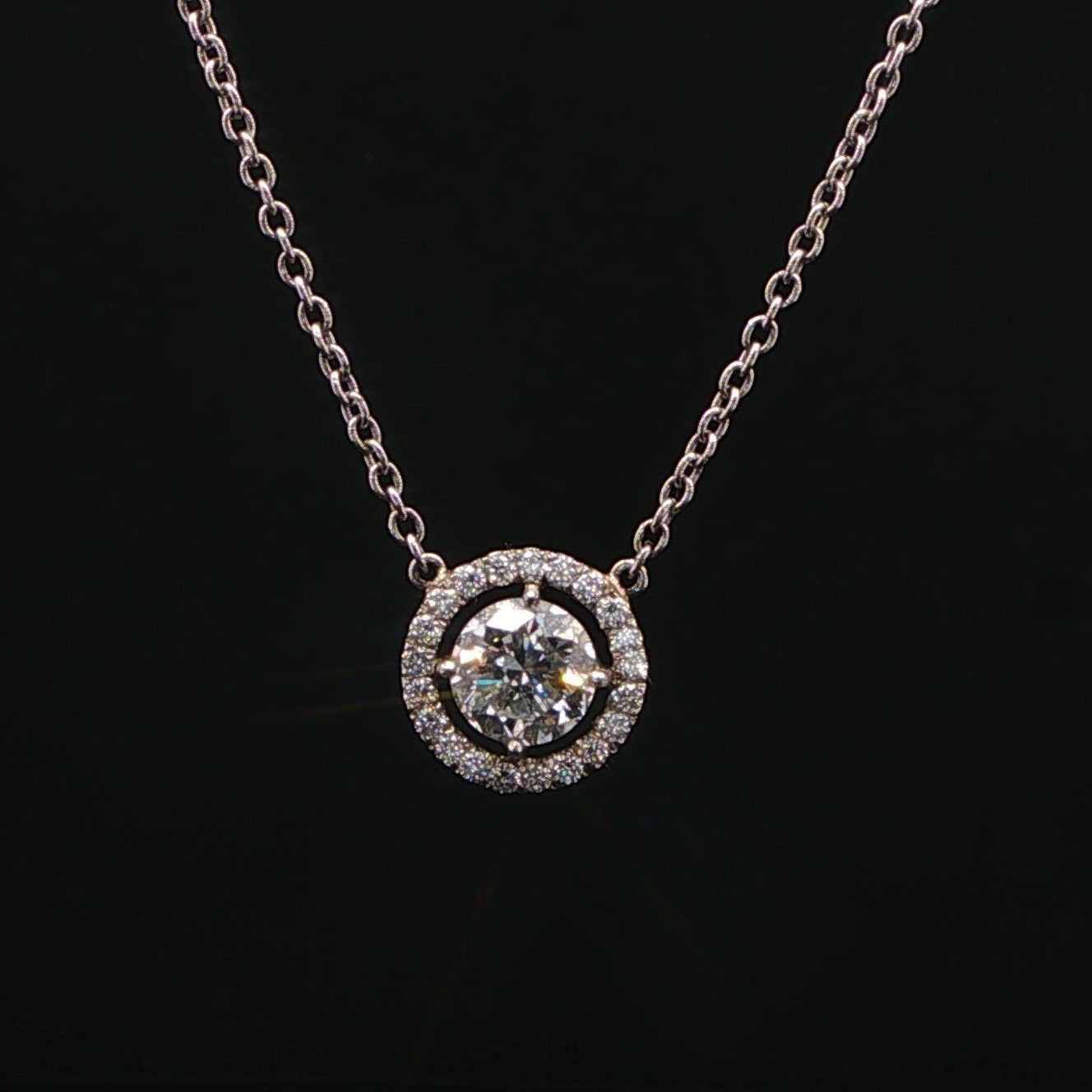 Platinum and Diamond Halo Pendant Necklace