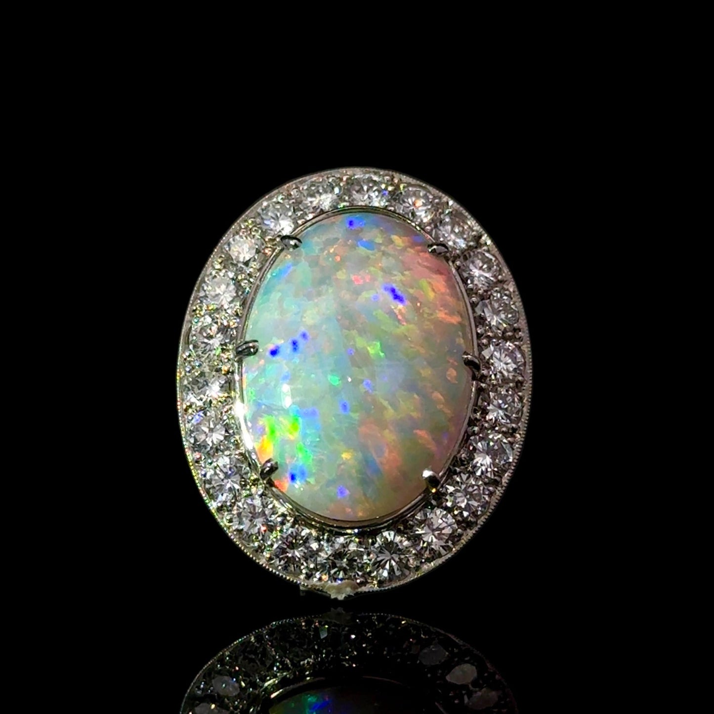 18Cct White Gold 10.30ct Opal and 2.70ct Diamond Ring